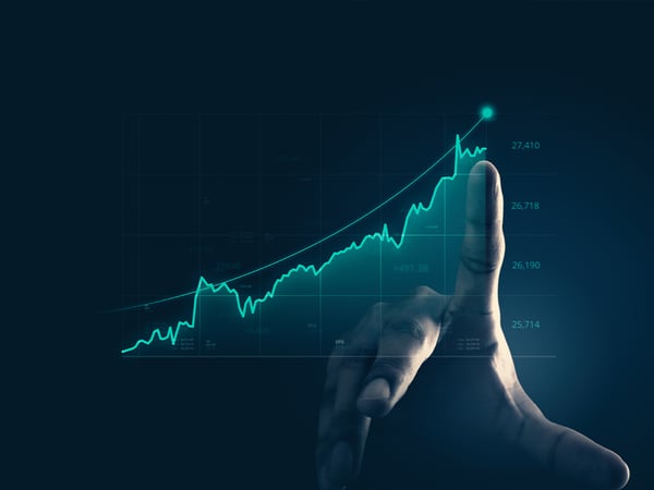 Rising chart with a finger pointing at it